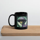 Close-up of Ethereal Dreams Beyond Style Black Glossy Mug handle.